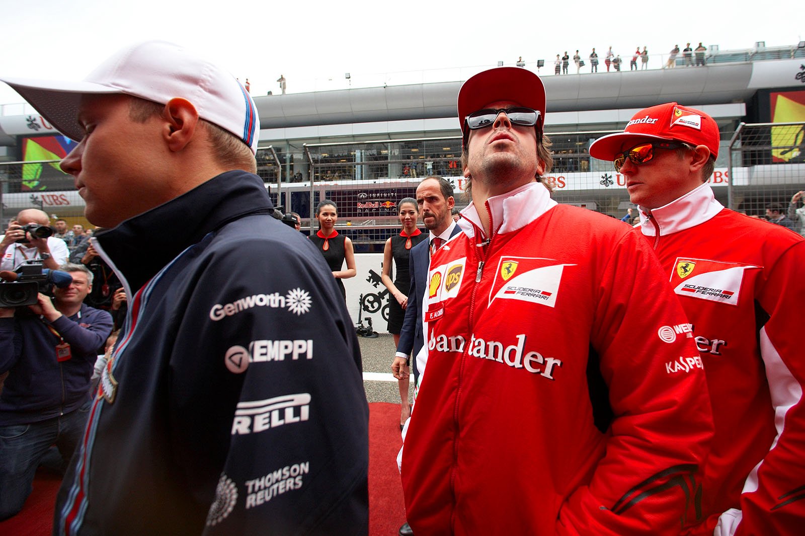 Alonso takes a look towards the large group of Ferrari fans on the grand stand