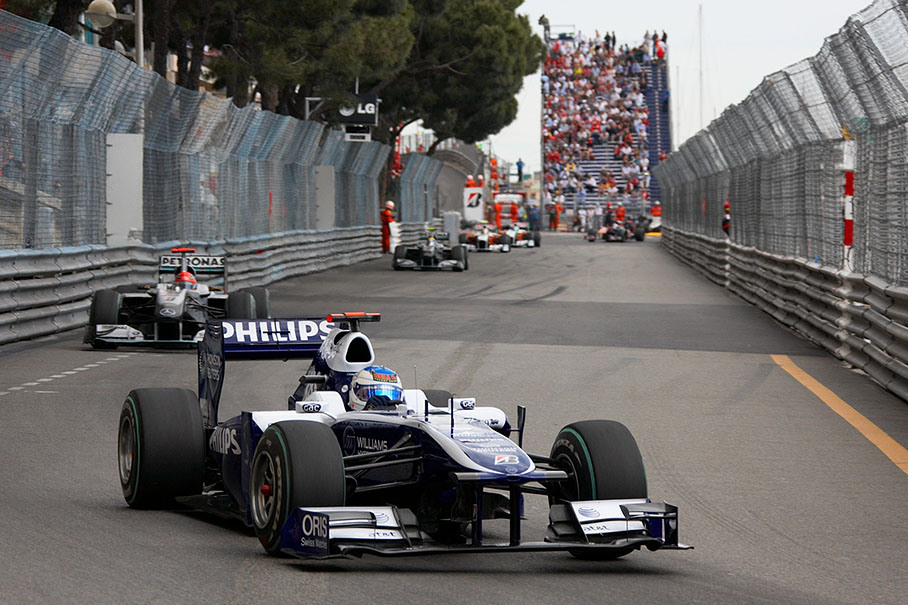 Rubens Barrichello, Williams, in front of his former Ferrari team mate, Michael Schumacher