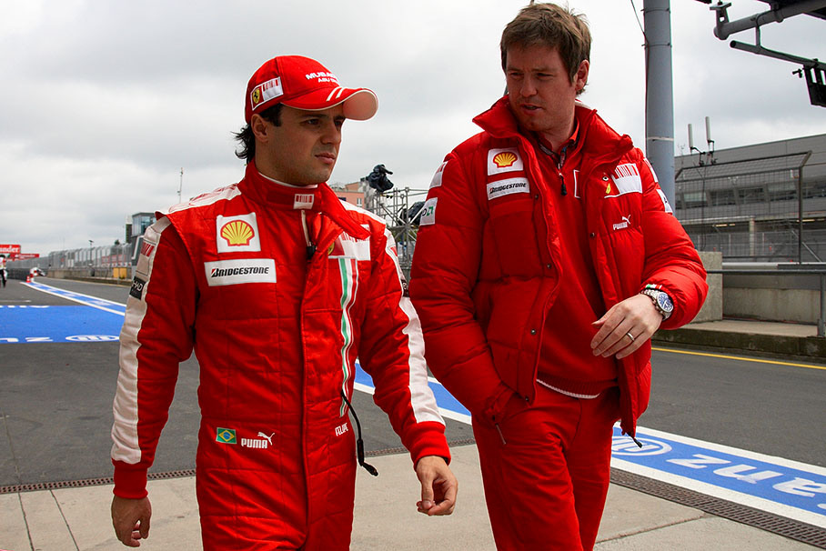 Felipe Massa walks with Ferrari race engineer Rob Smedley