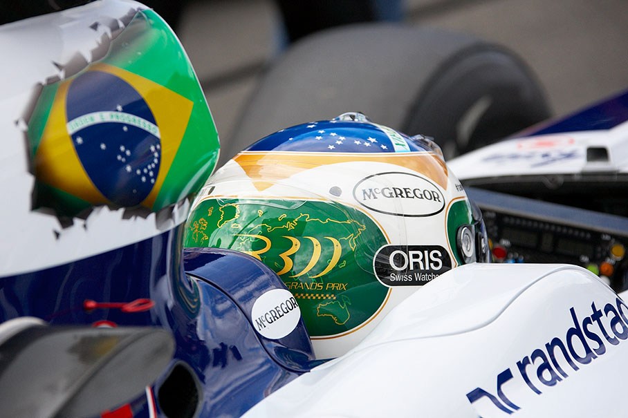 Rubens Barrichello's Williams-Cosworth's and his helmet's livery celebrate his 300th GP with the Brazilian national banner