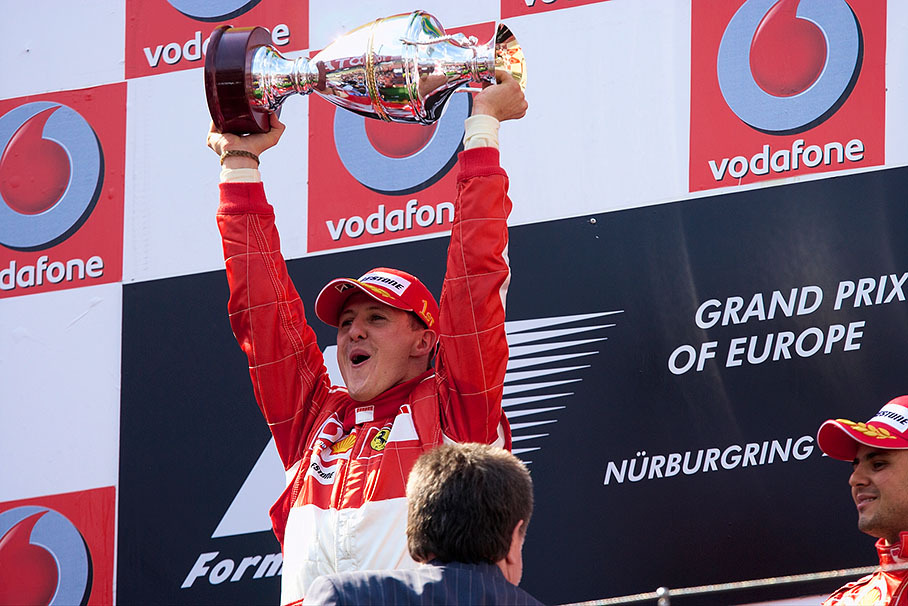 Michael Schumacher presenting his trophy