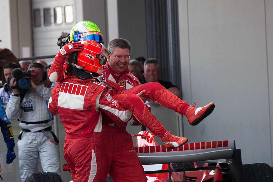 Remarkable third placed Felipe Massa being carried to podium ceremony