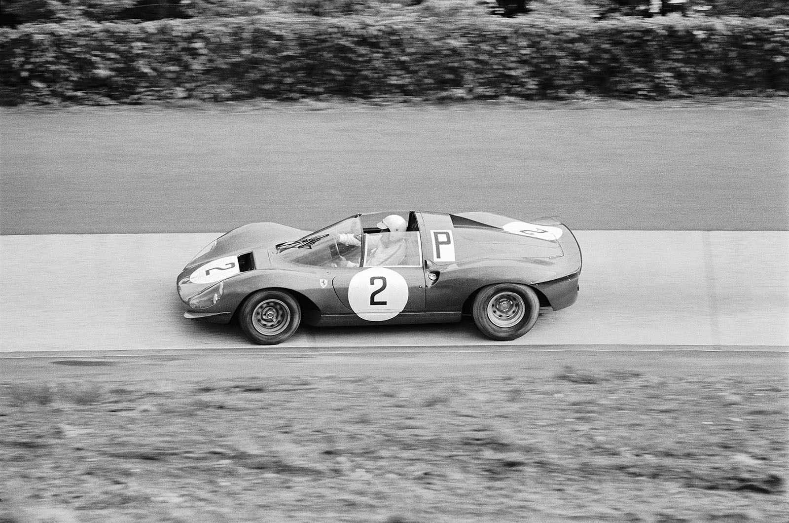 G¸nther Klass (D) and Ludovico Scarfiotti (I) move the Ferrari Dino 246S #004 for practice only
