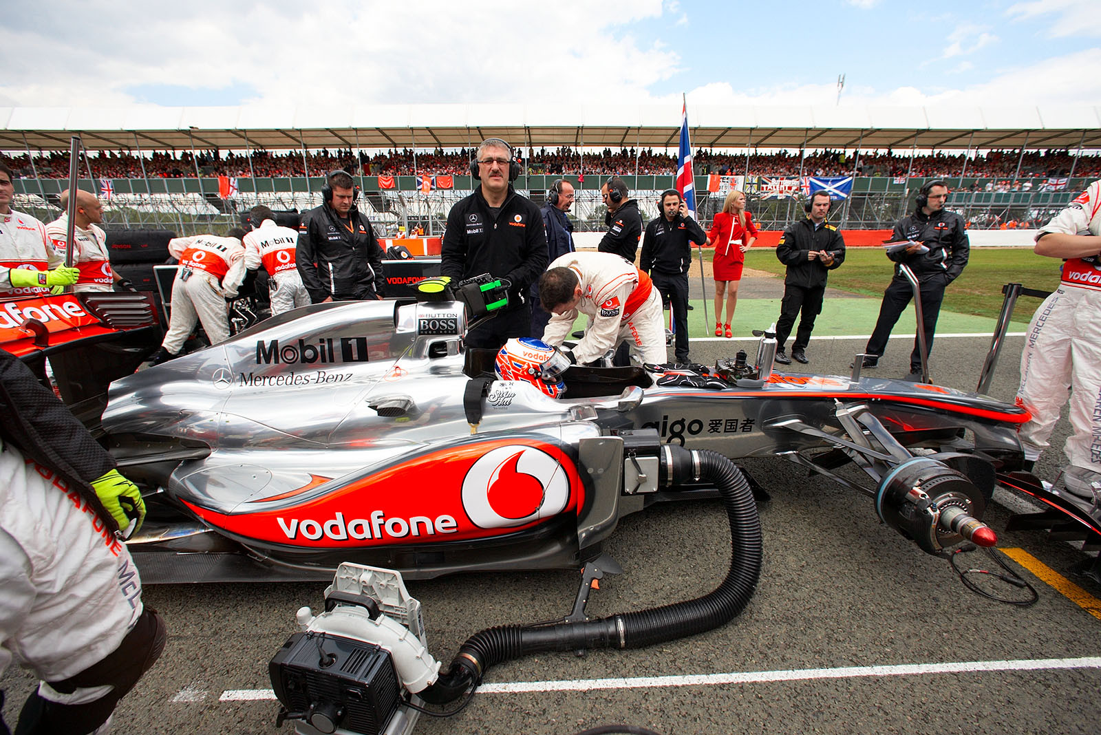 Jenson Button is ready seated in the McLaren Mercedes car on the grid
