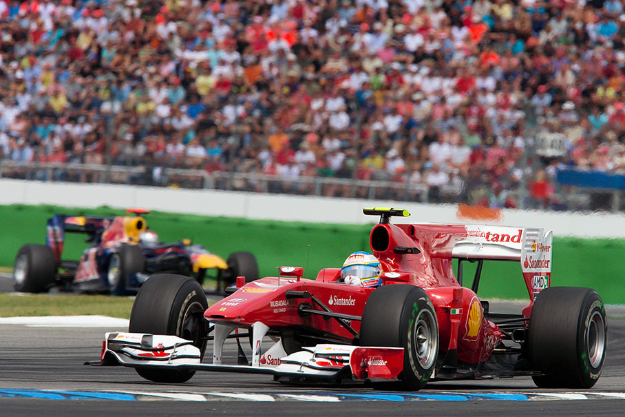Ferrari's Alonso leads Vettel