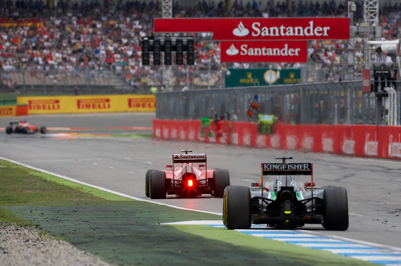 Start-finish line with both Ferraris and the Force India of Hulkenberg, Hockenheim, German Grand Prix, 2014