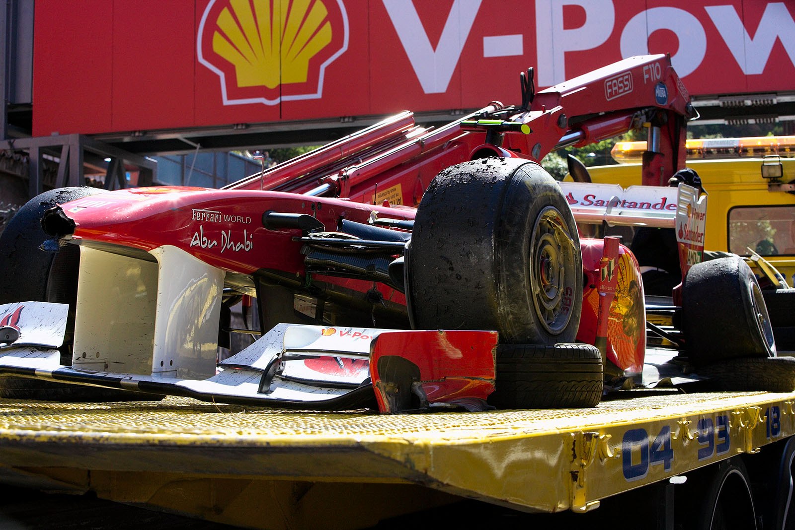 Felipe Massa's Ferrari car is returned to pits after the race.