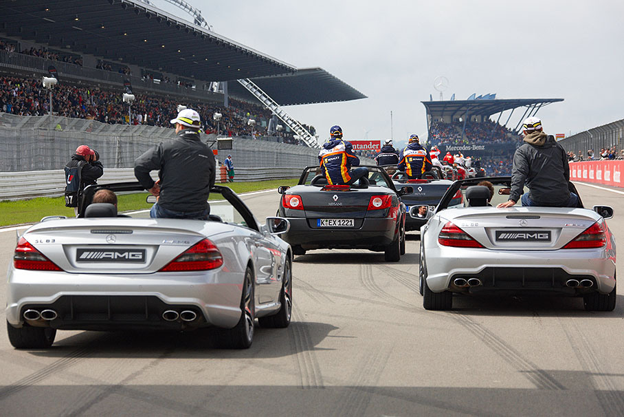 Drivers parade in manufacturer's cars