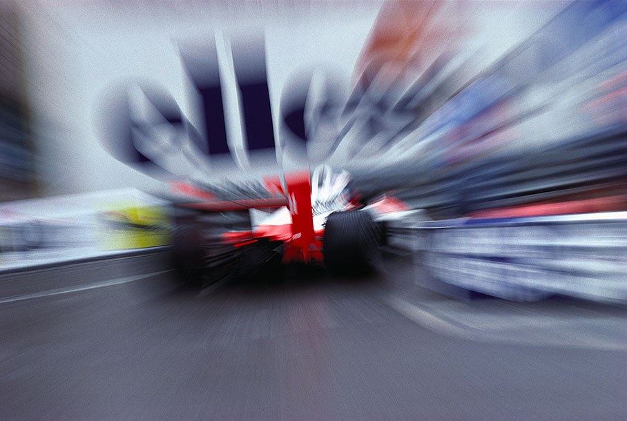 Alain Prost, McLaren-Honda, in a rainy practice session