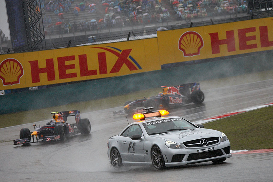 Still and again behind safety car: Vettel and Red Bull teammate Webber