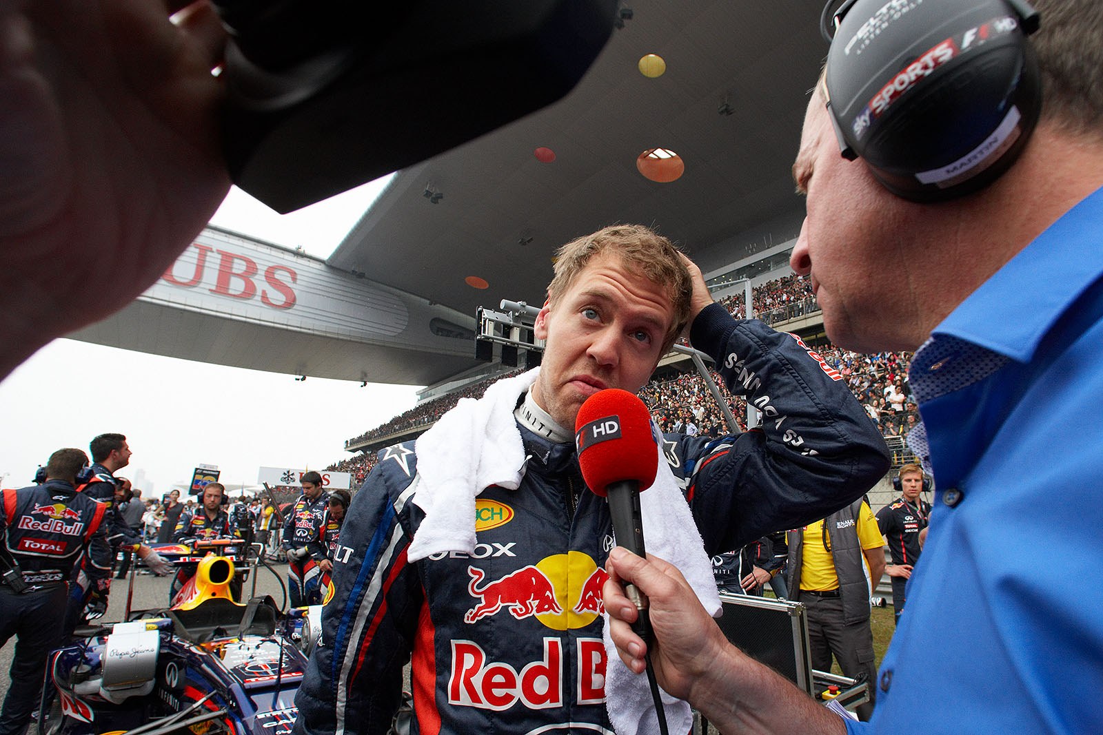 Sebastian Vettel, Red Bull Racing, gives an interview on the grid to former F1 driver and Sky TV presenter Martin Brundle before the race