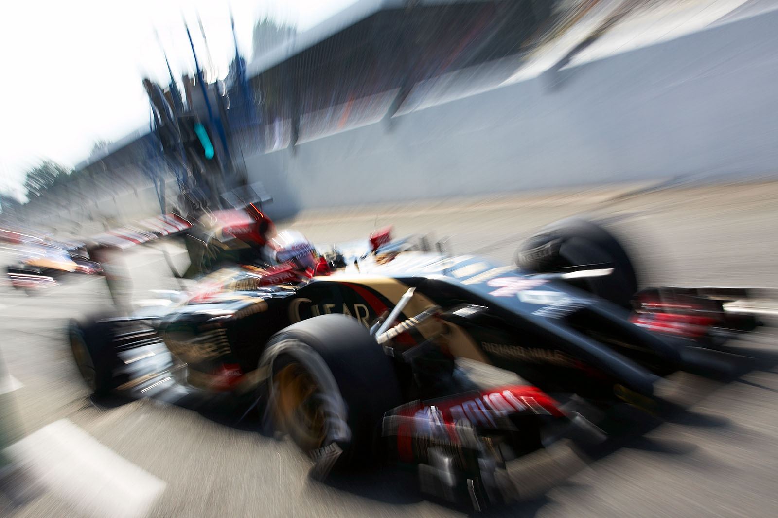 French Lotus-Renault driver Romain Grosjean on his way to his grid position on track, Italian Grand Prix, Monza, 2014