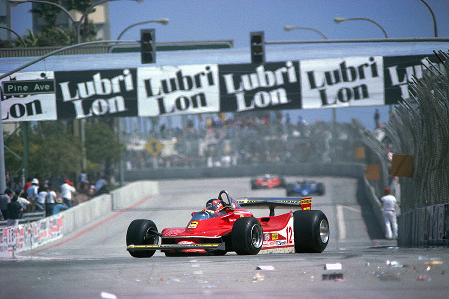 Gilles Villeneuve leading the race in the new Ferrari 312T4. His team-mate Jody Scheckter is far behind