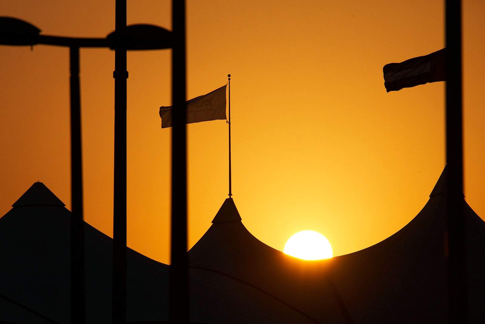 Sun sets above the desert in Abu Dhabi