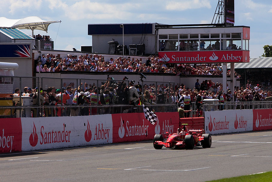 Kimi Raikkonen takes chequered flag and wins the British GP seconds ahead his followers