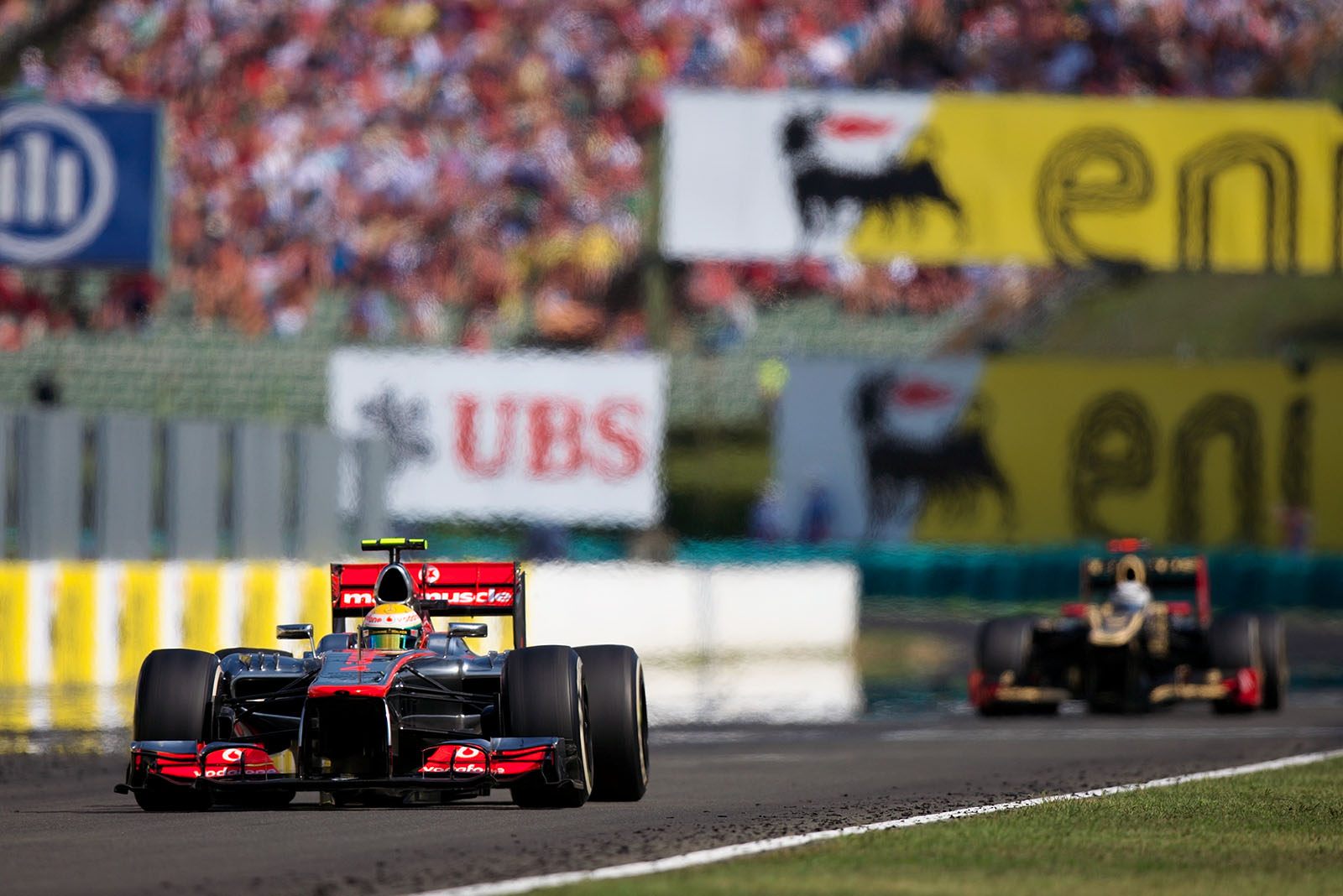 Race leader Lewis Hamilton, McLaren Mercedes, in front of chaser Raikkonen