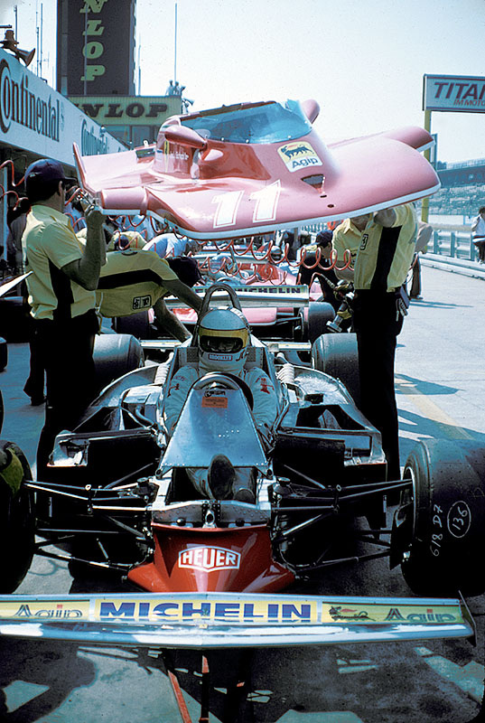 Ferrari mechanics take the bodywork off from Jody Scheckter's Ferrari, German GP Hockenheim 1979