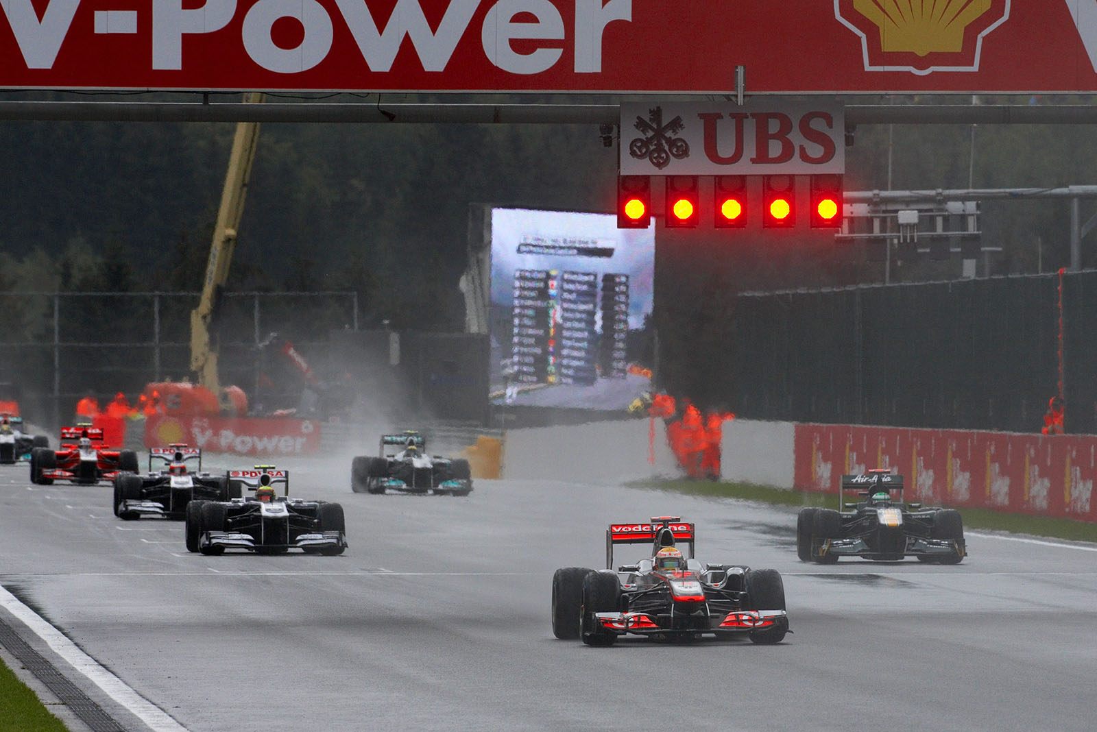 After Friday practice the drivers practise start manoeuvres on a wet track