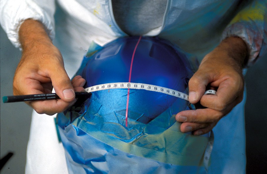Peter Ginneken of BELL Helmets S.A. making the artwork of the 1998 Suzuka race helmet for Michael Schumacher