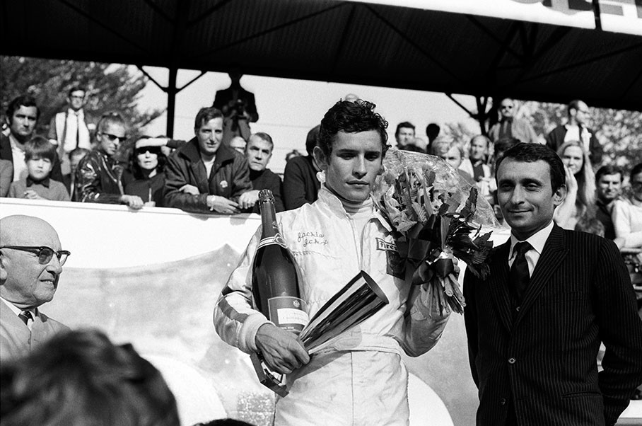 A sad podium ceremony for Jacky Ickx because Honda driver Jo Schlesser crashed in third lap and died (as fourth F1 driver during the season).