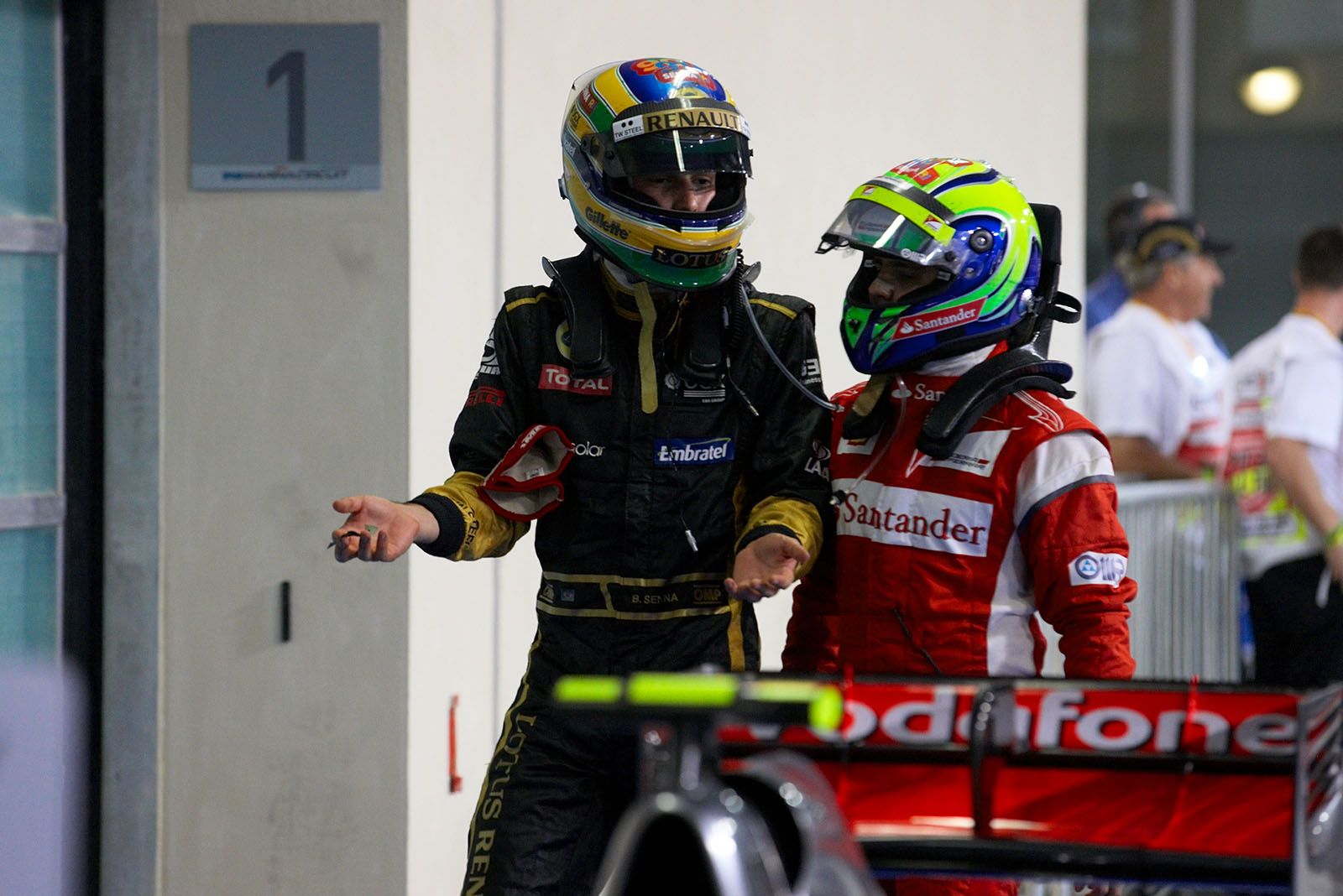 The two Brazilians chat after the race - Bruno Senna of Lotus Renault GP (16th placed) and Felipe Massa of Ferrari (5th)