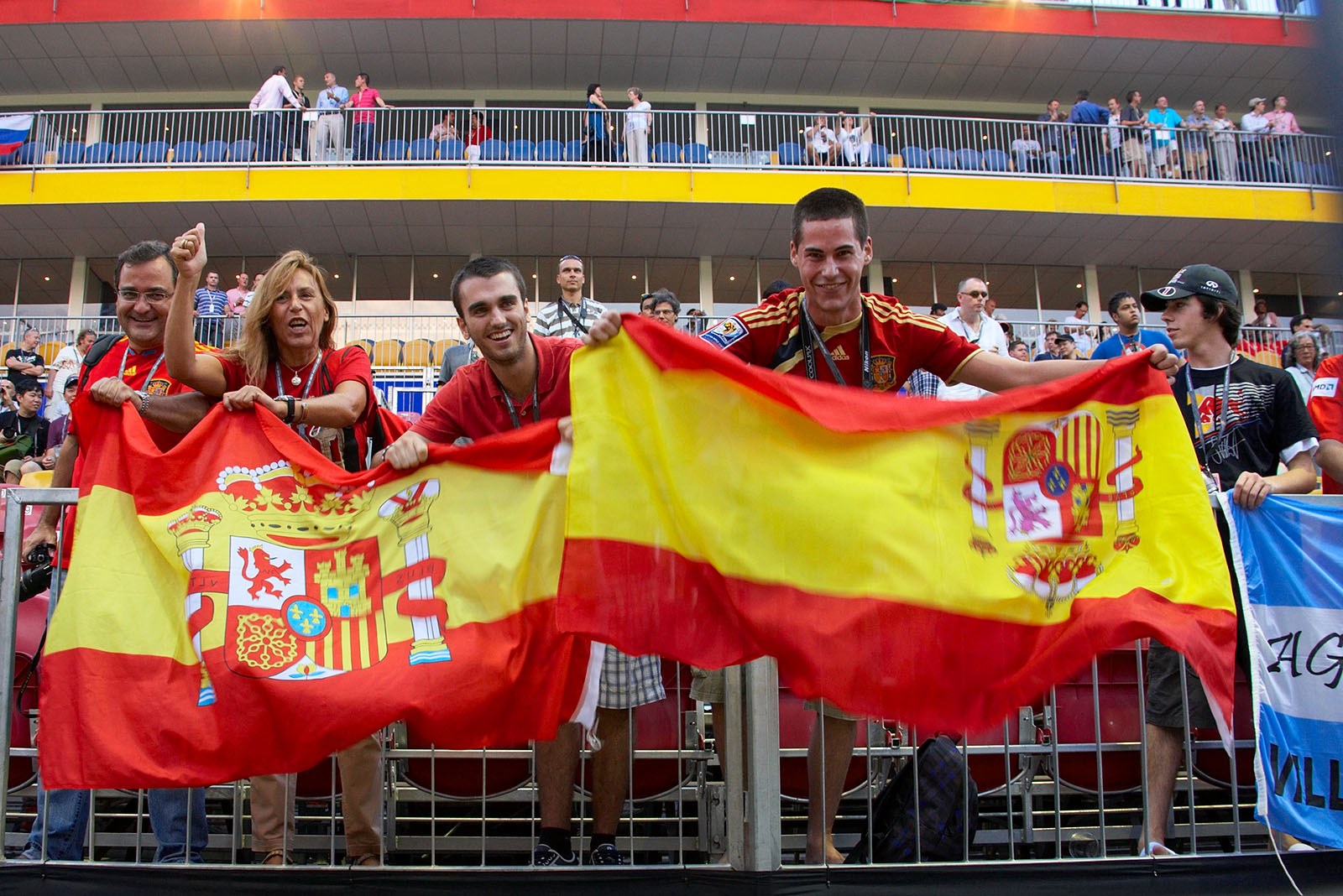 Spanish fans cheer from the stand