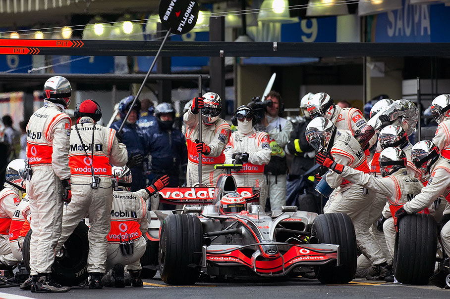 Heikki Kovalainen ends his pit stop at McLaren pits