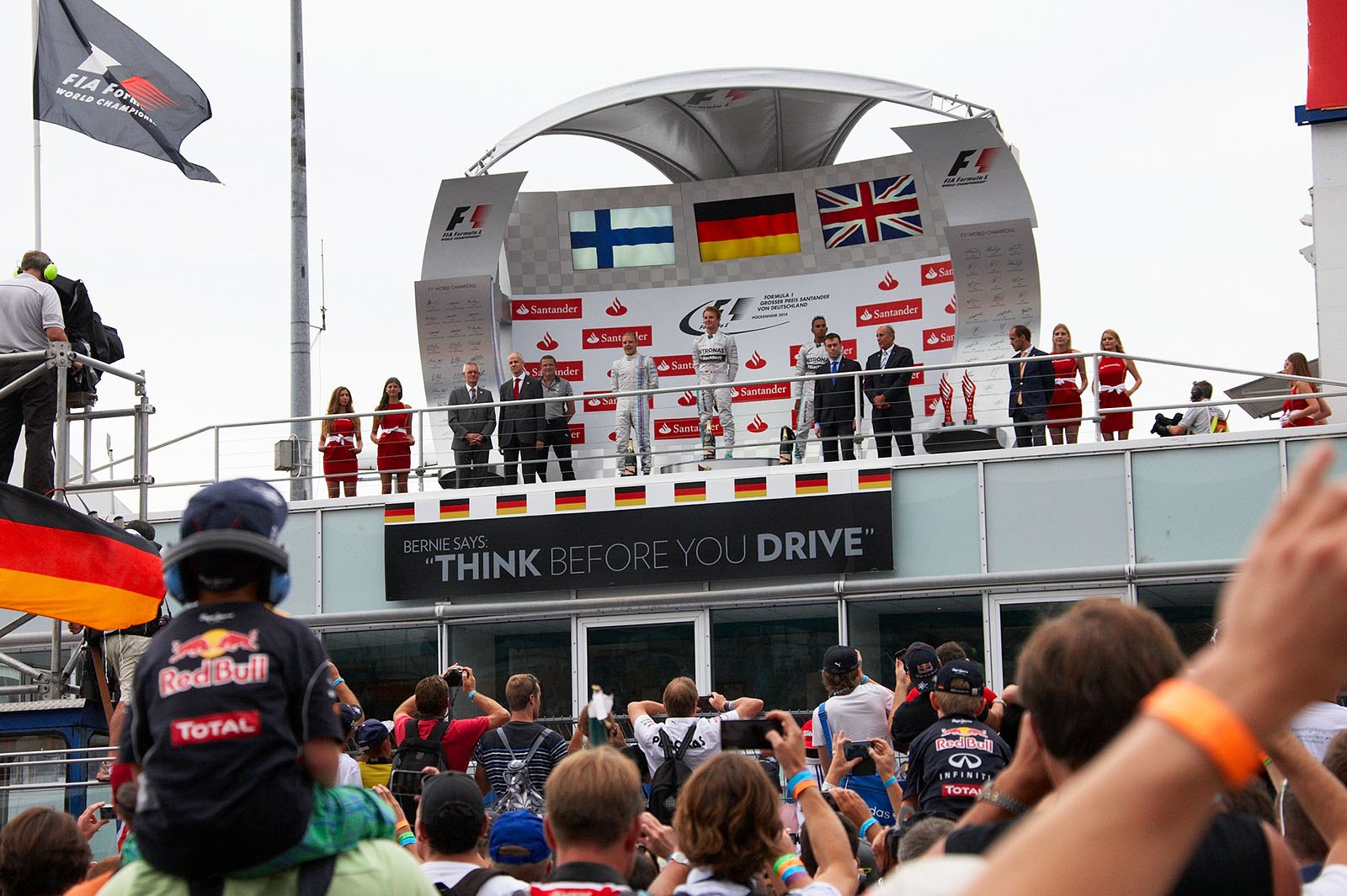 The top three drivers on the podium: Bottas, Rosberg and Hamilton, Hockenheim, German Grand Prix, 2014
