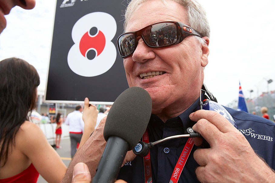 Patrick Head, co-founder and Engineering Director of the Williams Formula One team, gives an inrterview in font of Nakajima's grid place