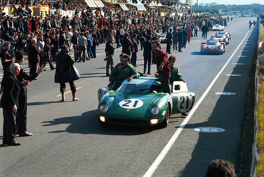 David Piper (GB) and Richard Attwood (GB) on Ferrari 250 LM #8165 return to pits after the 24hr race as second placed in S5.0 group (seventh overall)