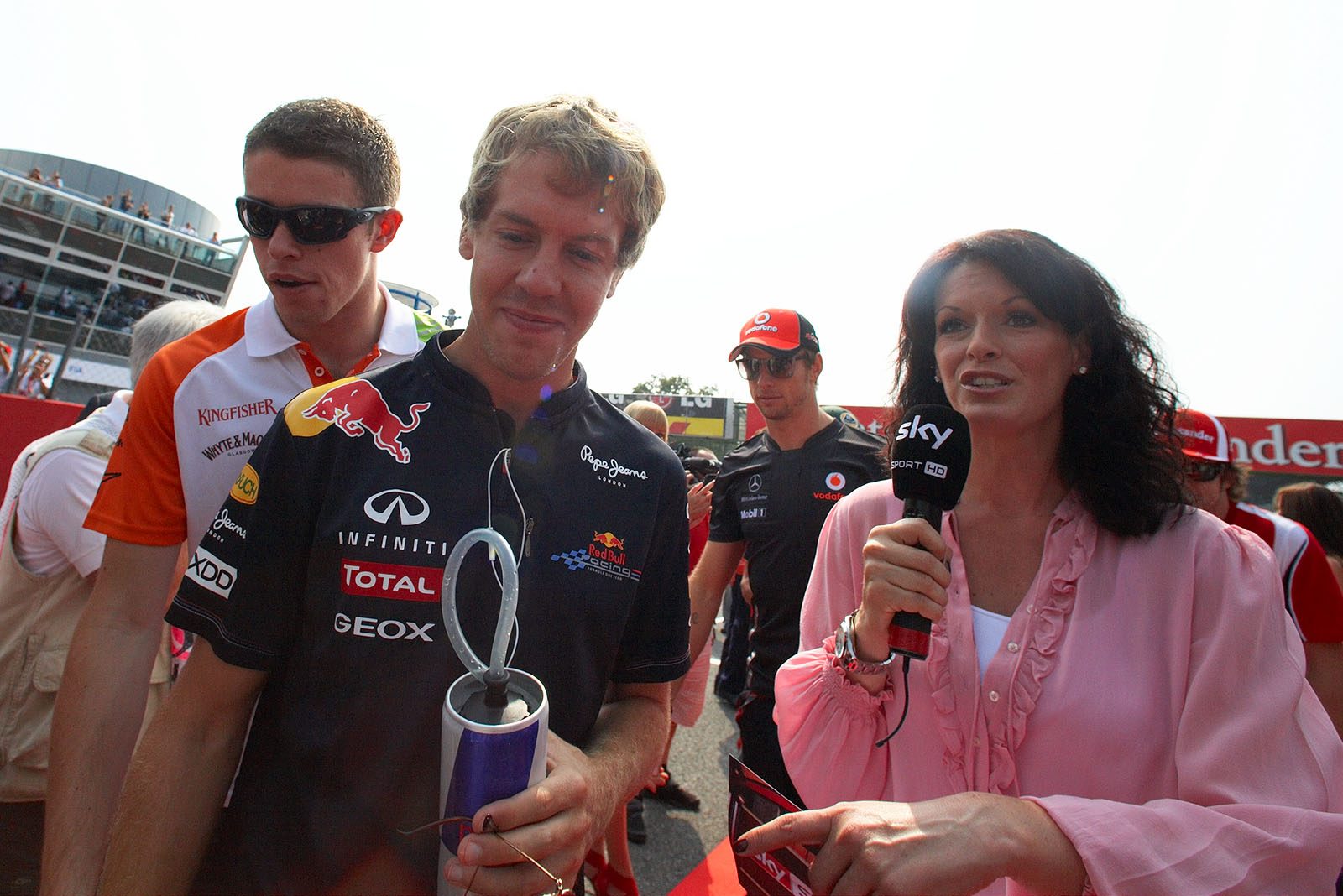 Tanja Bauer interviews Sebastian Vettel before drivers parade