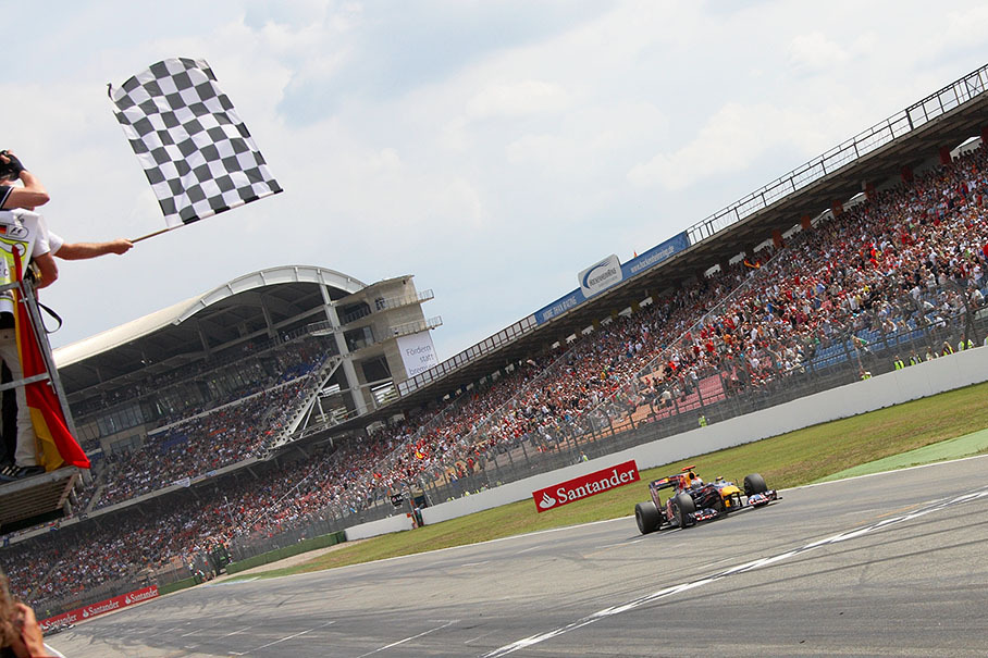 Sebastian Vettel, Red Bull Racing, takes the chequered flag on third position