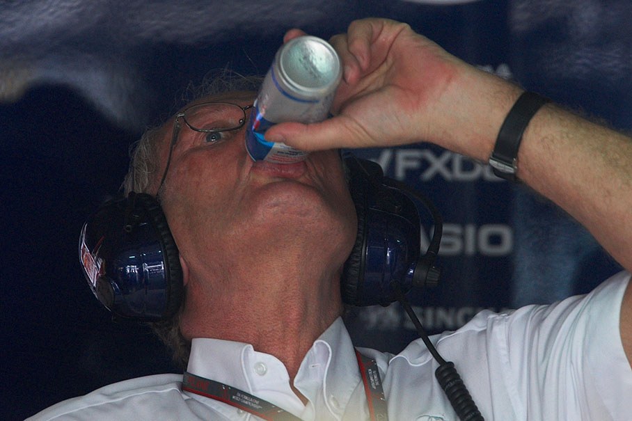 Red Bull's Dr. Helmut Marko takes a sip of energy