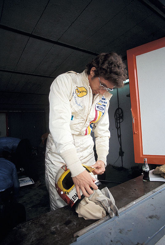 Rolf Stommelen checks the visor of his helmet in Brabham pits before the Spanish GP Montjuich 1971