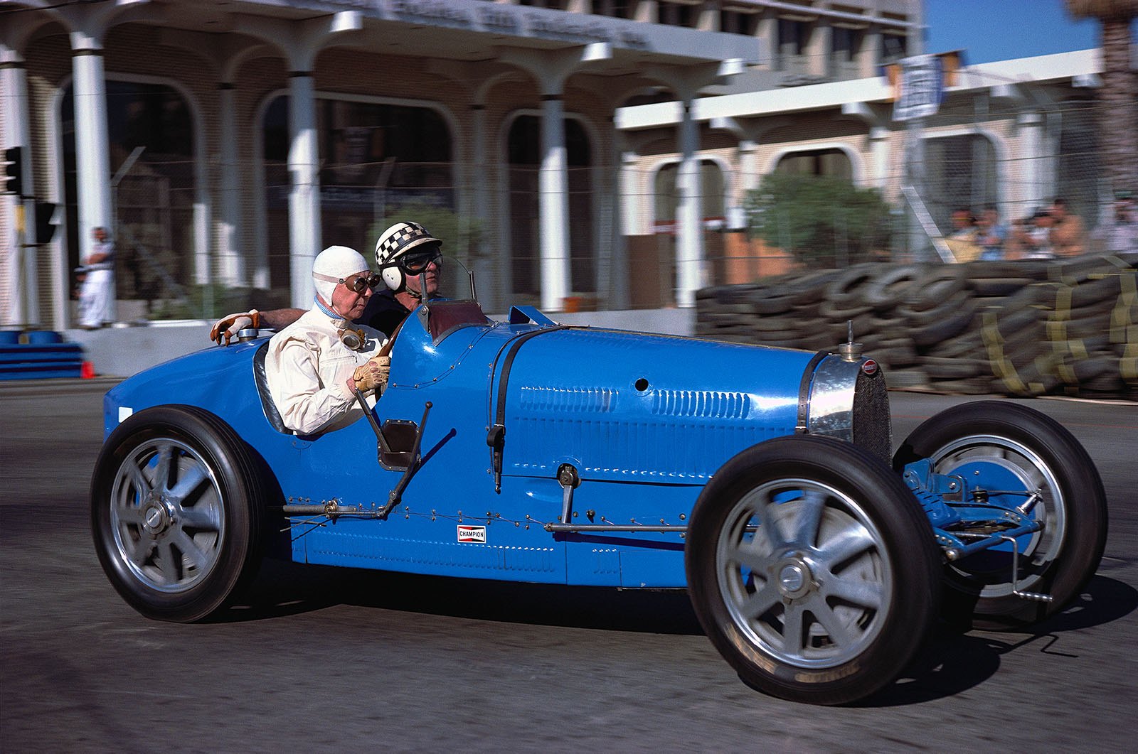 Former F1 driver Innes Ireland in a 1930's Bugatti