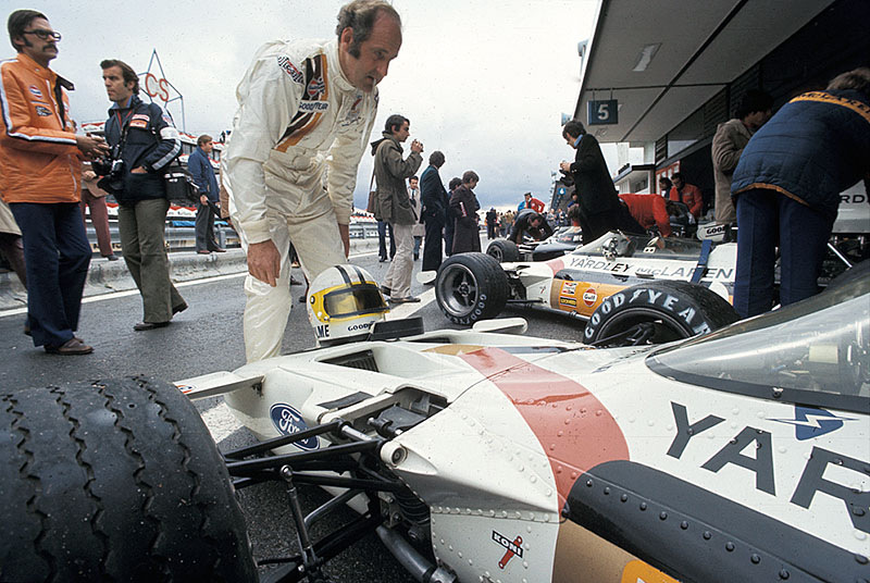 Denny Hulme checks his McLaren-Cosworth M19C car before the Spanish GP Jarama 1972