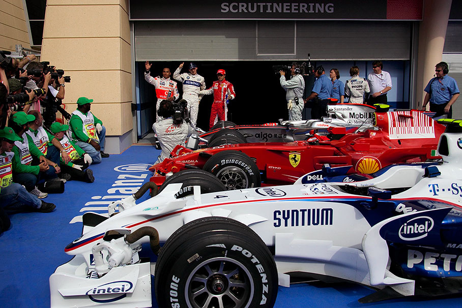 Parc ferme after qualifying, the tree fastest drivers Kubica with Massa and Hamilton greet the audience
