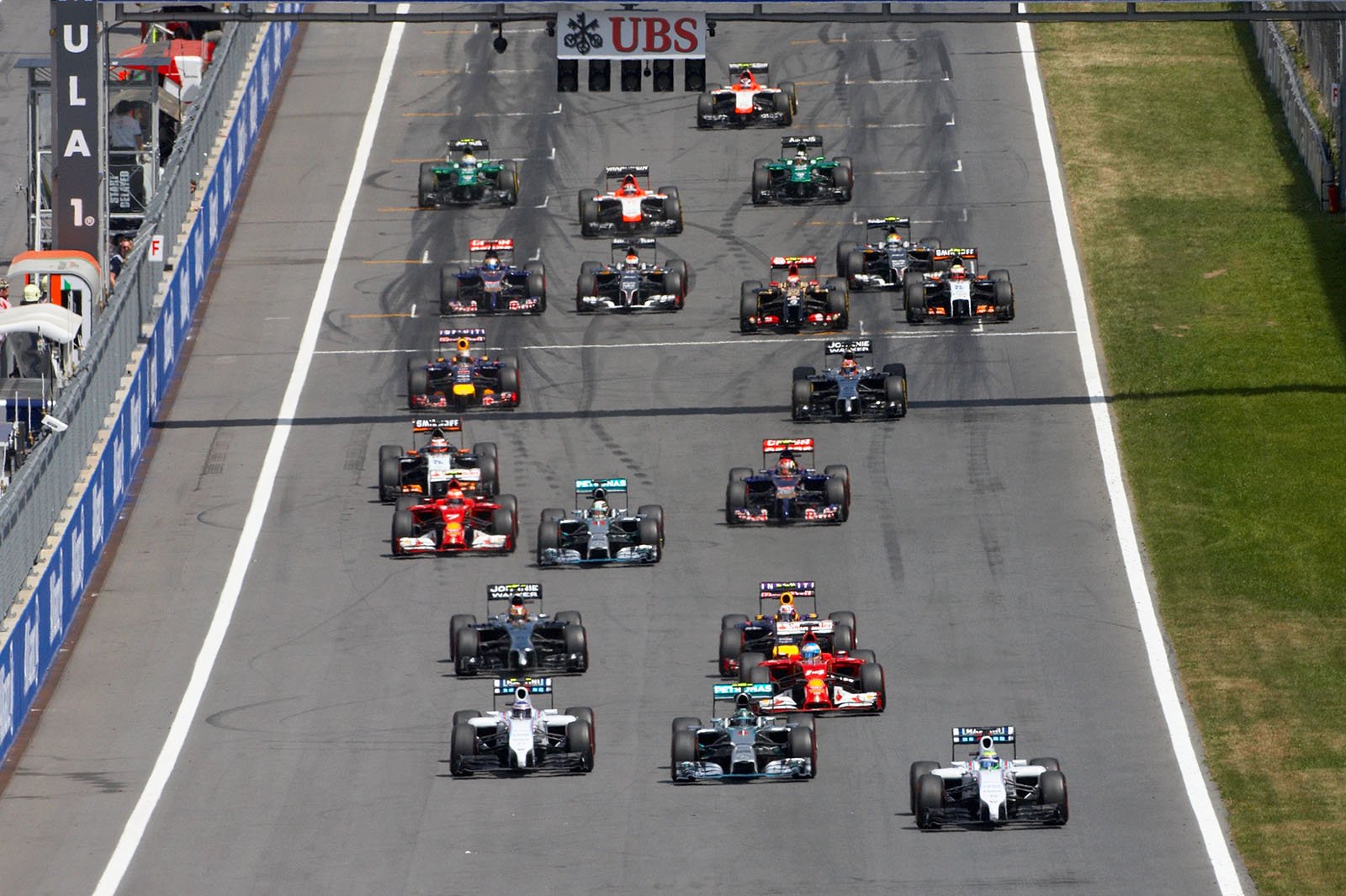Felipe Massa in the lead, while team-mate Valtteri Bottas and Nico Rosberg, Mercedes, are fighting for position, Spielberg, Austrian Grand Prix, 2014