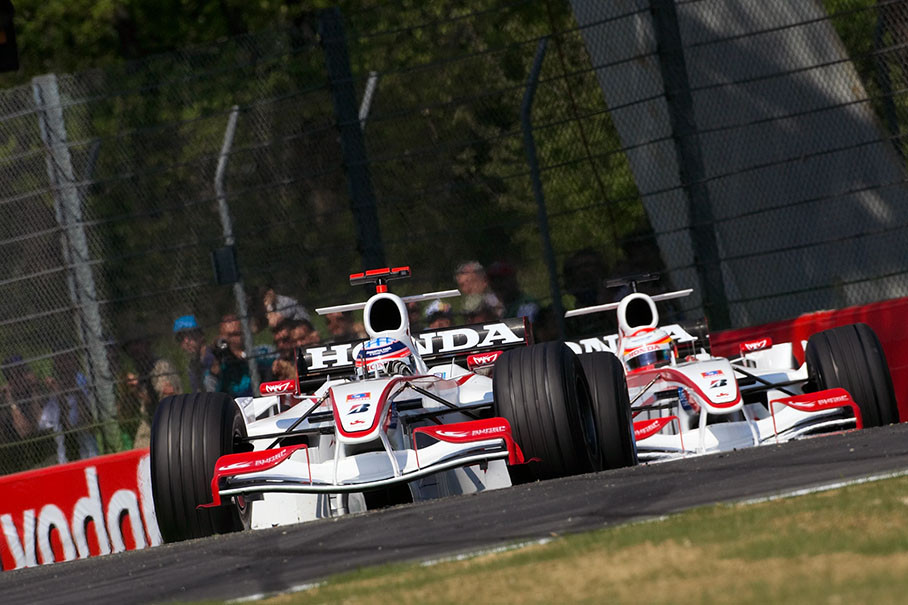 Super Aguri team colleagues Takuma Sato and Yuji Ide approaching Variante Alta