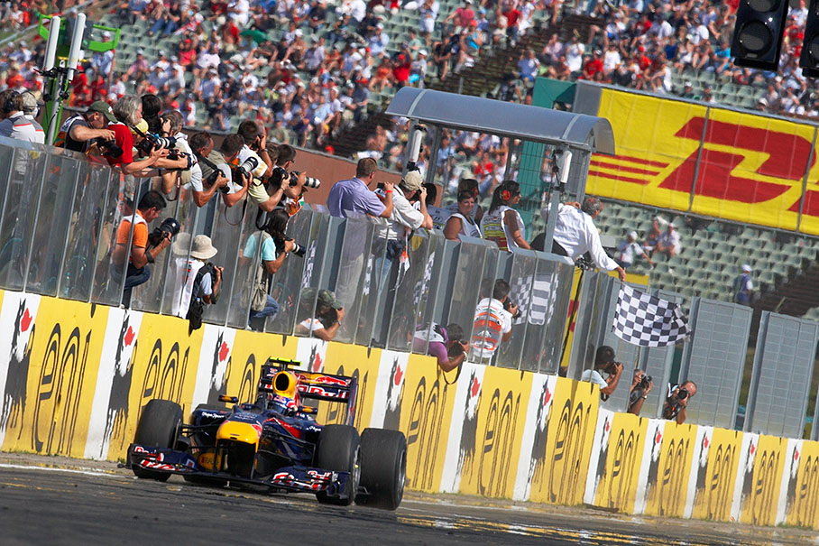 Mark Webber, Red Bull Racing, takes the chequered flag and wins the Hungarian GP, now leading the Driver's World Championship after round 12 with 161 points