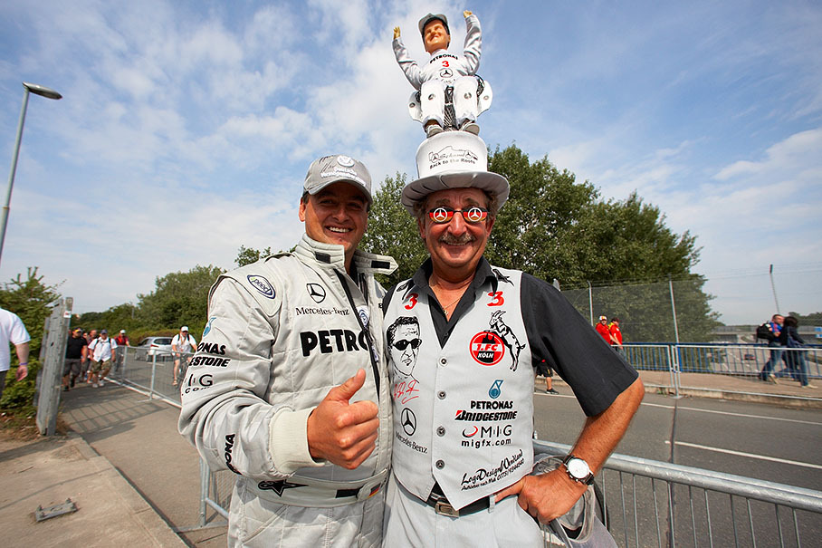 Two devoted Schumacher fans welcome the crowds