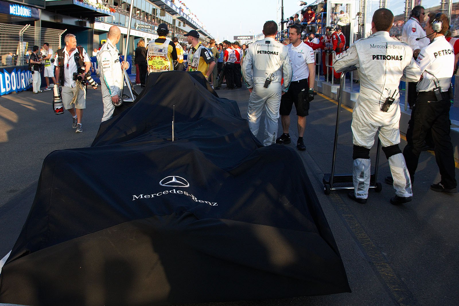 The Mercedes GP crew packs together straight after the race (this seems to be Schumachers car going to scrutineering)