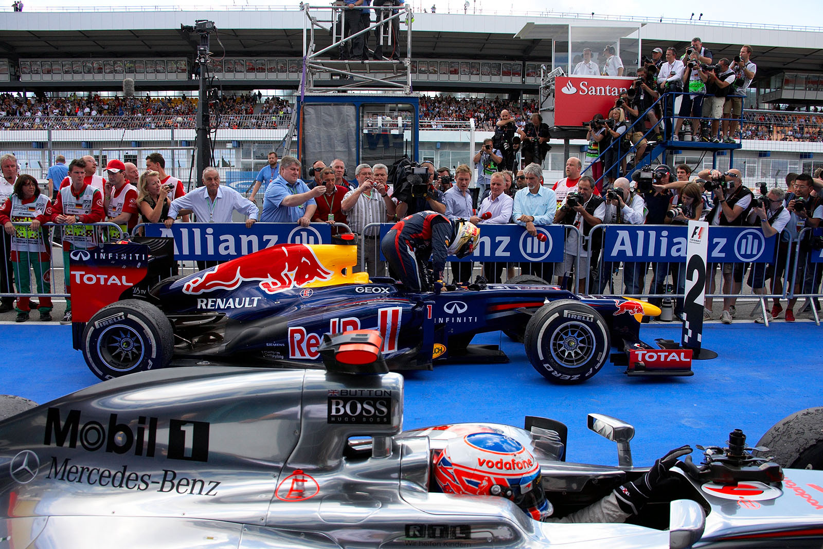 Second placed Sebastian Vettel gets out of his RBR car in parc ferme after the German Grand Prix - after finishing second on the track, Sebastian Vettel was penalised 20-seconds and becomes fifth placed