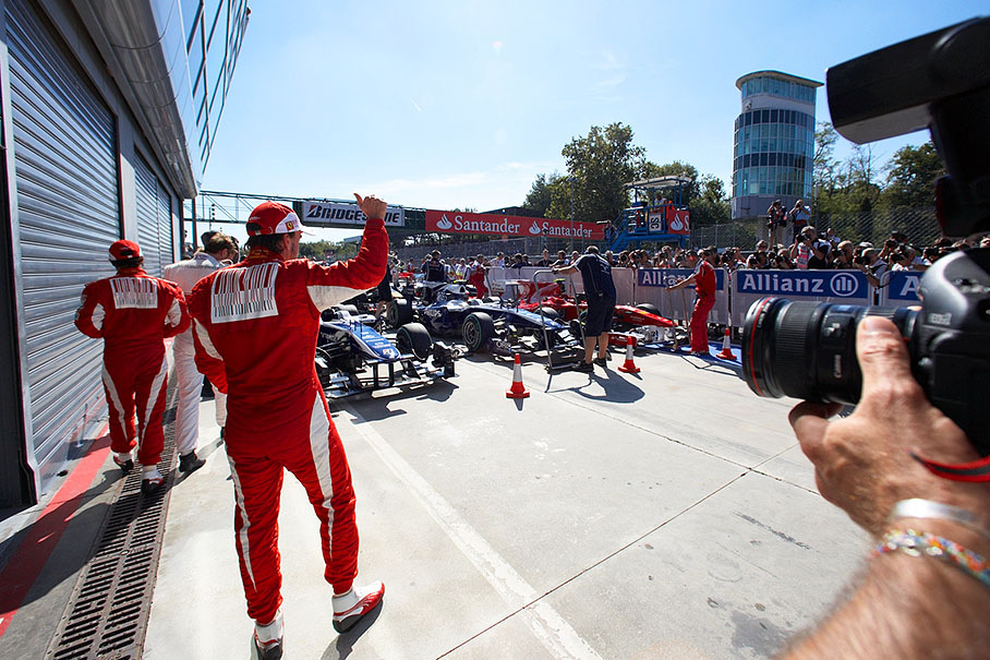 Pole sitter Alonso celebrates in parc ferme after qualifying