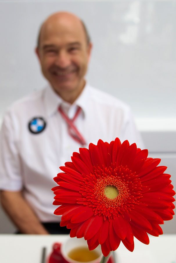 Flower power at BMW Sauber, Peter Sauber enjoying beauty of nature