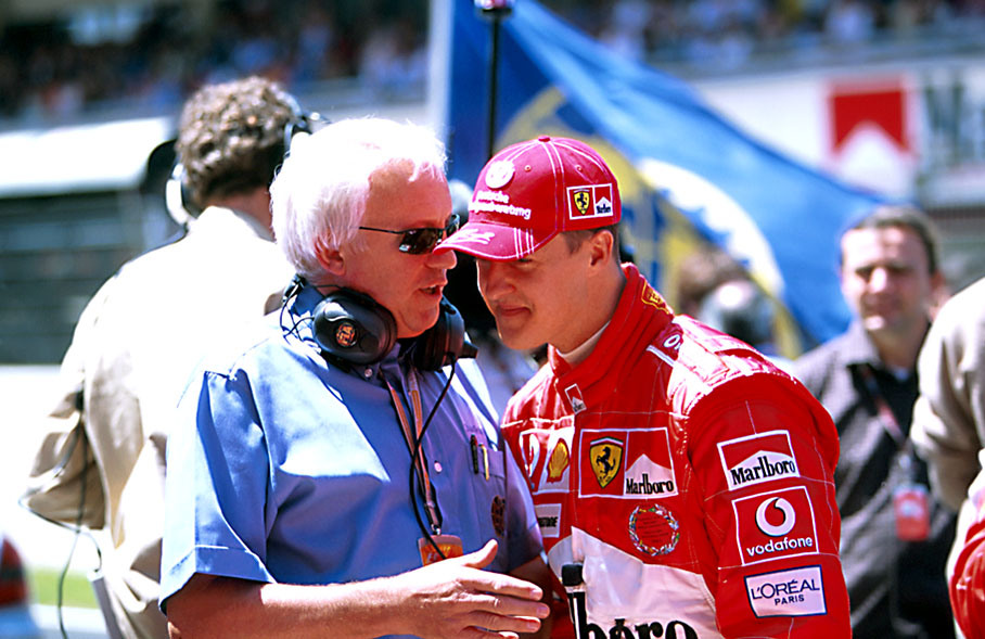 Race Director Charlie Whiting and Michael Schumacher