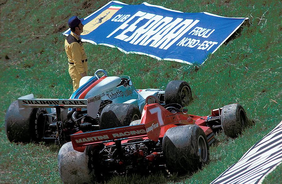 John Watson's Brabham-Alfa Romeo and a Shadow-Cosworth besides the track after a practice session prior to the 1977 Austrian GP