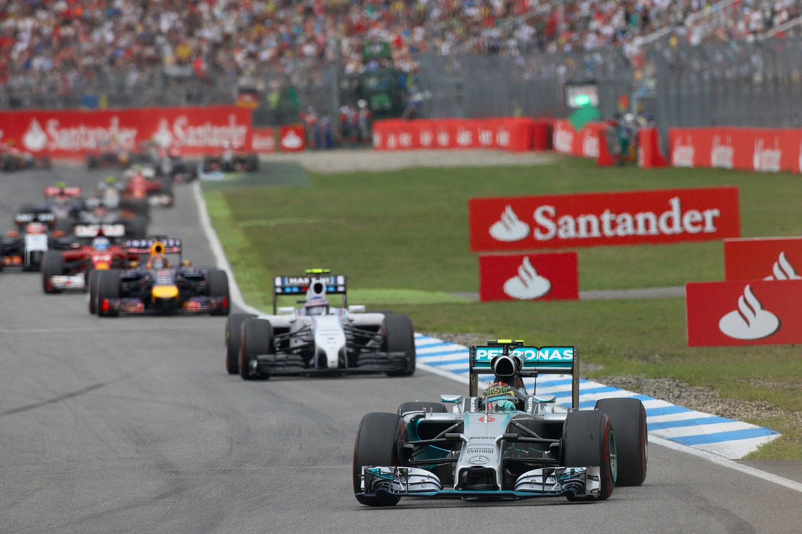 Race clear again, with leader Nico Rosberg, Mercedes, followed by Bottas in the Williams, Vettel in the Red Bull and Alonso's Ferrari, Hockenheim, German Grand Prix, 2014