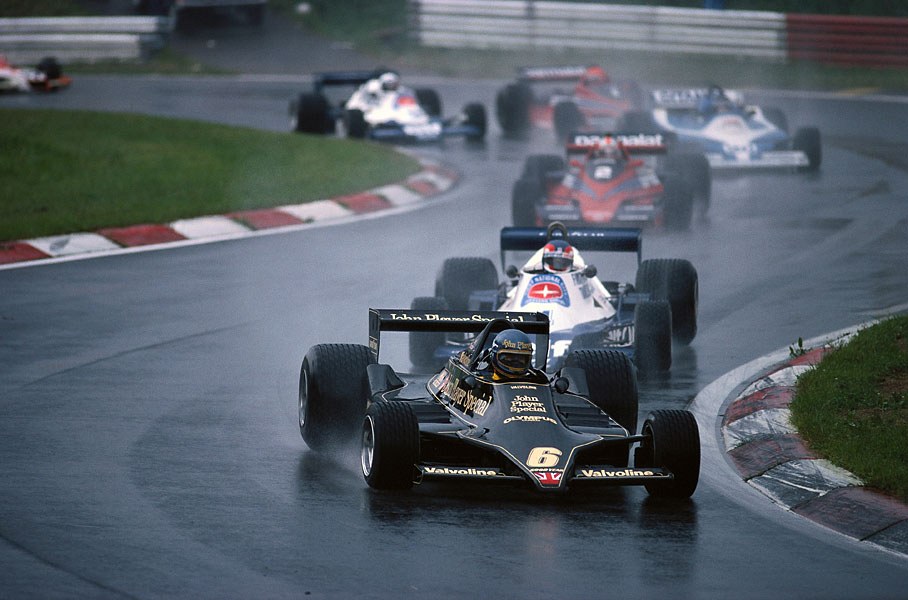 Ronnie Peterson (Lotus) leading Patrick Depailler (Tyrrell) and John Watson (Brabham).