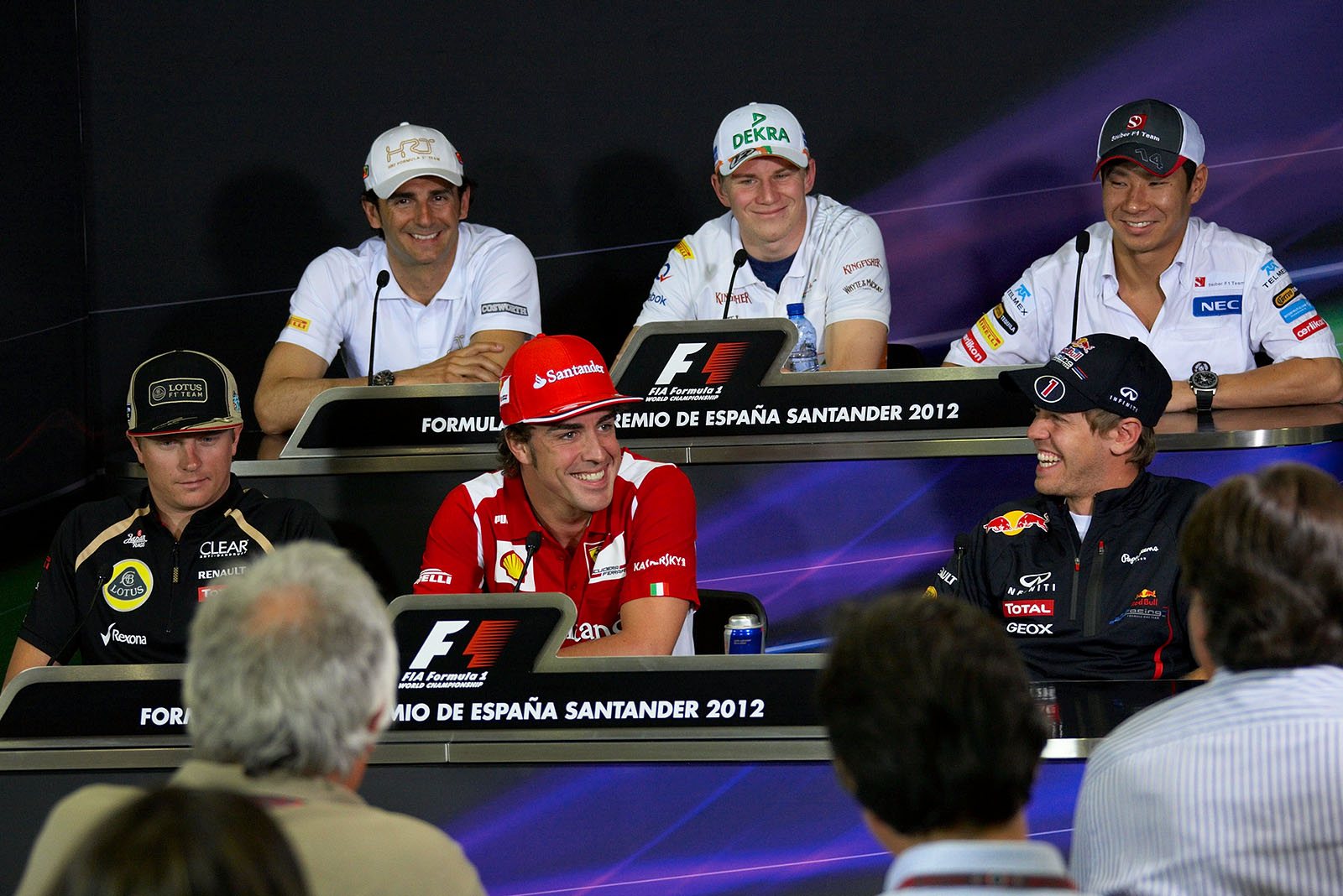 During the press conference on Thursday laughers shake Lotus' Kimi Raikkonen, Pedro de la Rosa of HRT, Ferrari's Fernando Alonso, Force India's Nico Huelkenberg, Sebastian Vettel of Red Bull and Sauber's Kamui Kobayashi